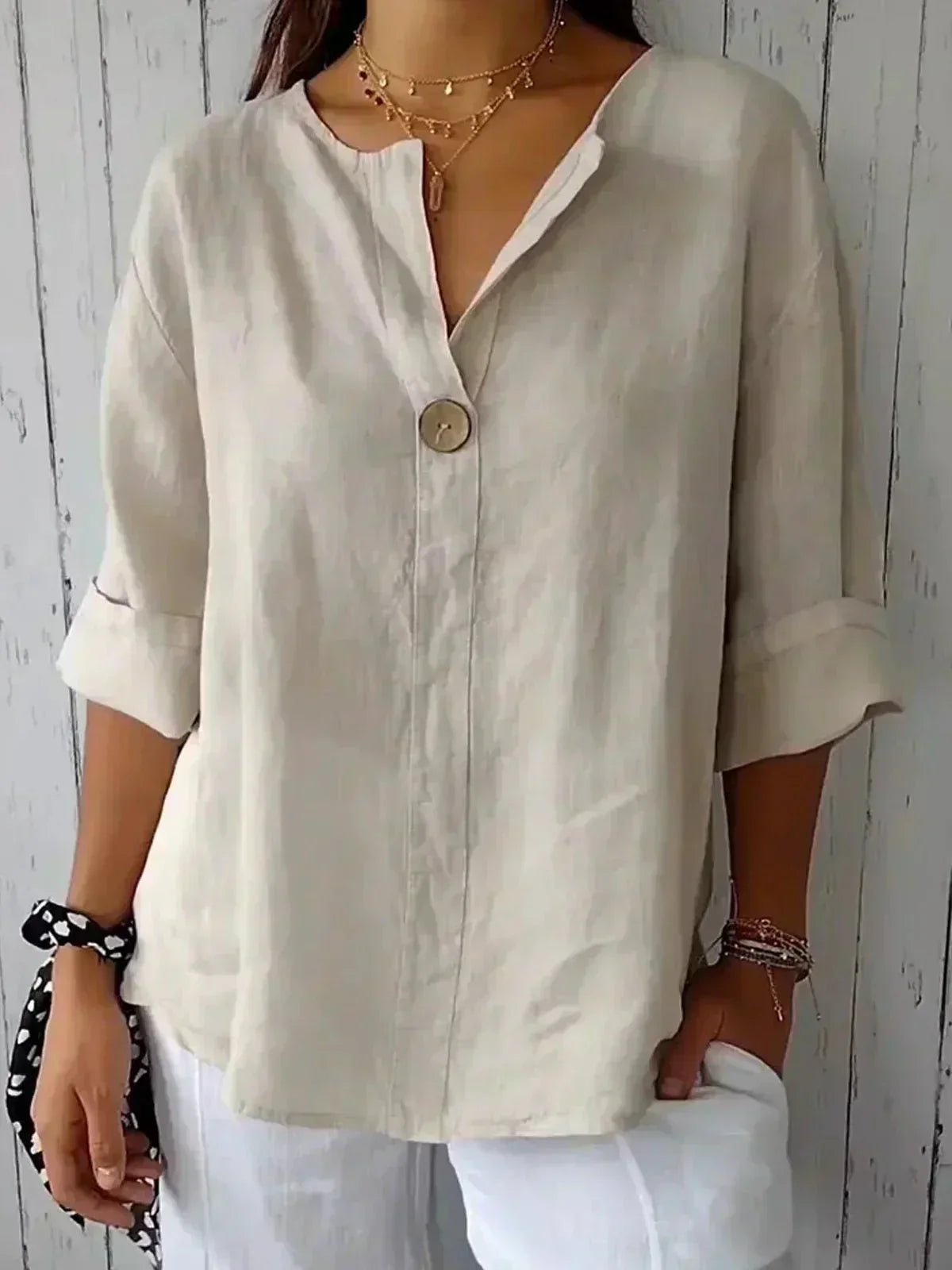 GEMMA | TOP HOLGADO CON CUELLO EN V
