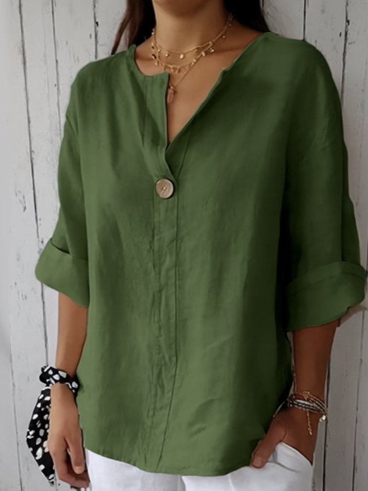 GEMMA | TOP HOLGADO CON CUELLO EN V