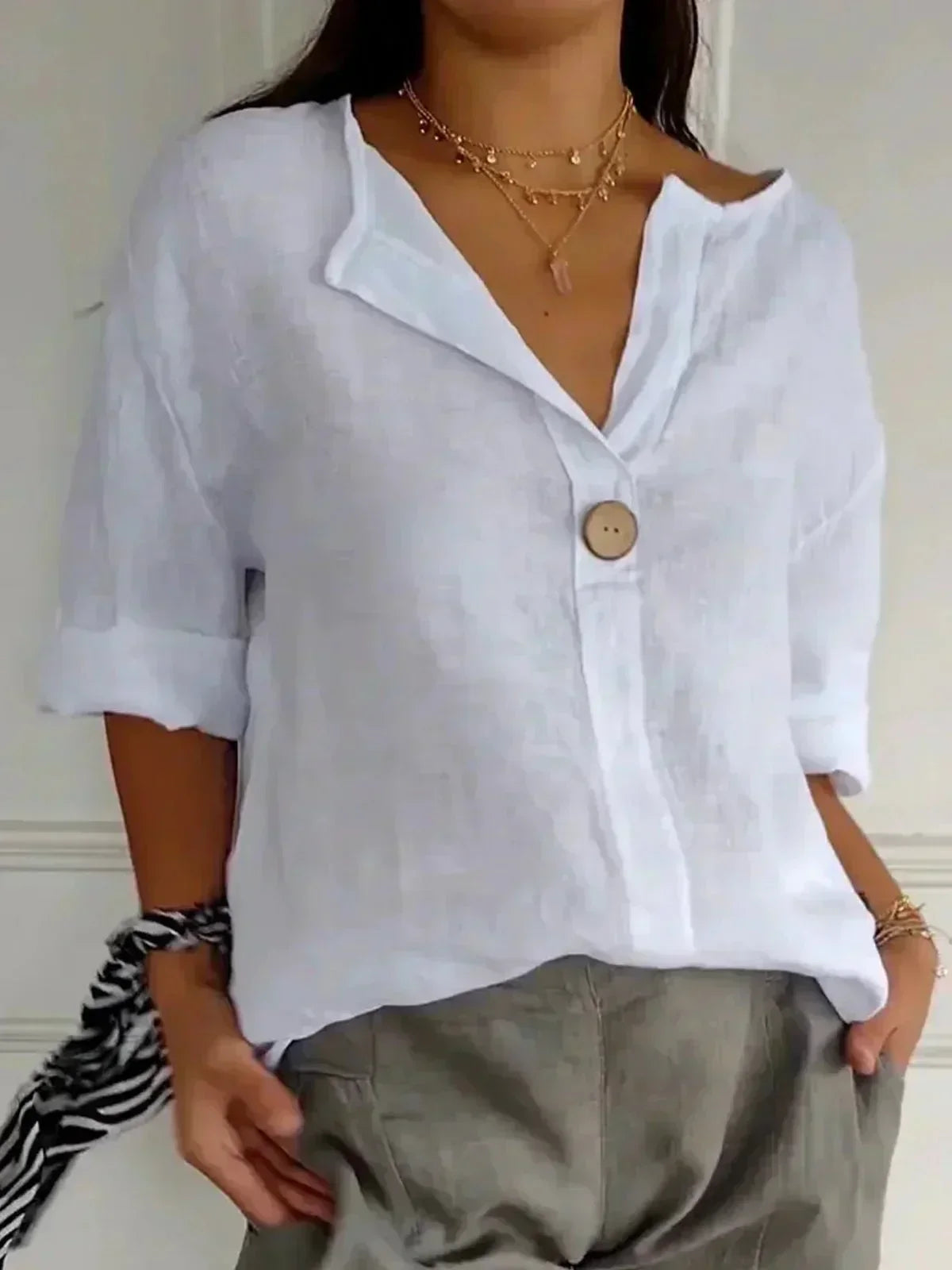 GEMMA | TOP HOLGADO CON CUELLO EN V